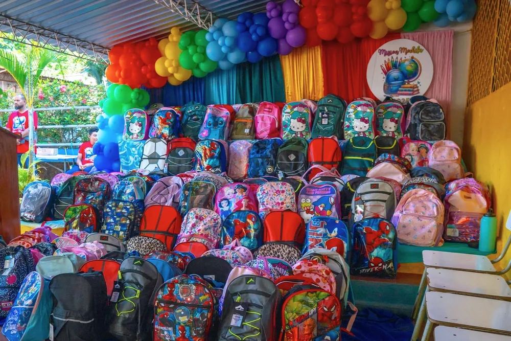 Rows of colorful backpacks ready for delivery